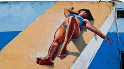 Street Art in Israel: eine Frau liegt im Bikini in der Sonne.