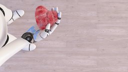Roboter hält ein Herz in der Hand